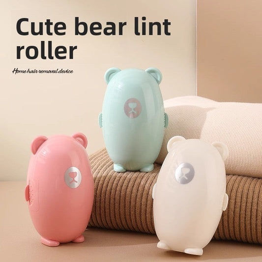 ShopTrendora™ cute bear-shaped reusable lint roller in pink, mint green, and cream colors. Washable adhesive for effective pet hair and lint removal.